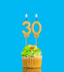 Candle number 30 - Birthday card with cupcake on blue background