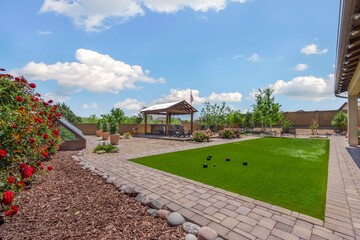 An attractive house featuring a spacious lawn area right in front of it