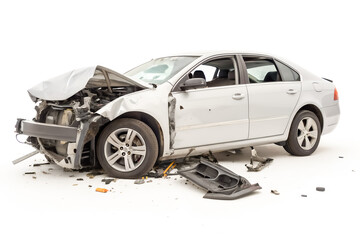 White sedan car broken after severe crash on the road isolated on white background and generated with AI