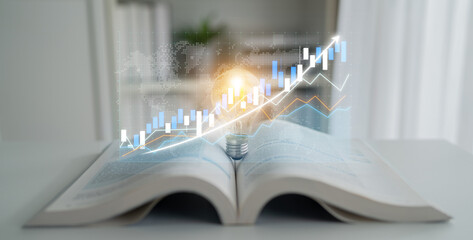 An open book with a glowing light bulb and digital graph illustrates concepts of growth, knowledge,...