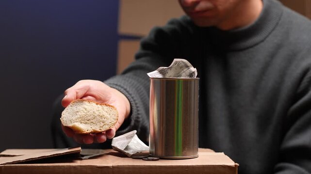 Homeless man begging for food and money aid