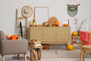 Interior of living room armchair, ladder and autumn decor