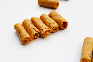 Rolled crispy wafers filled with shredded pork floss, Thai snack.