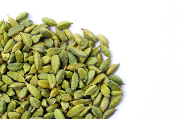 Green cardamom pods with aromatic and medicinal benefits.