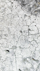 cracked gray concrete. texture or background