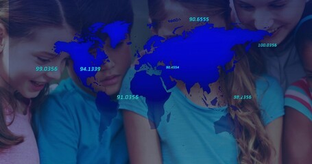 Leaning students and mentor studying interactive display in tech classroom, with numeric map labels