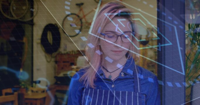 Standing woman wearing striped apron and glasses at bicycle shop, with digital overlays and tools