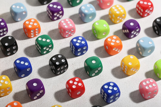 Colorful game dices on light background