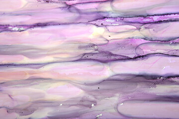 Art background of ink stains in purple colors