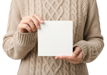 Person holding a blank white square card in front of their body