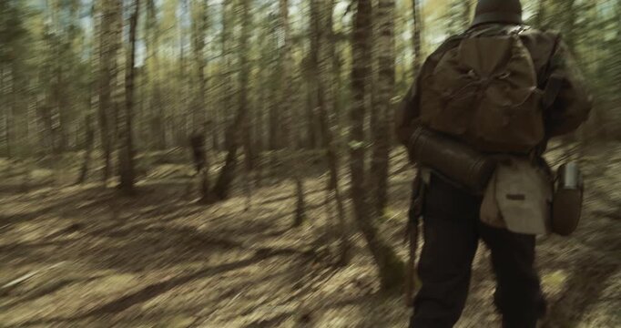 Running For Group Of Soldiers With Carabines Mauser 98k, Sub-machine Gun In Forest. Reenactors Dressed As German Infantry Soldiers Make War Ambush In Autumn Forest. Wermacht Military Uniform