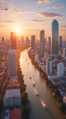 Fototapeta premium This gorgeous city sunset showcases tall reflective buildings along the river glowing beneath a rich blueish orange sky in warm ambience birdview landscape aesthetic photo