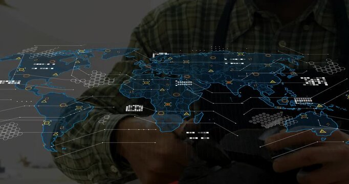 Senior artisan scraping leather edge initiating technology world map graphic animating overhead