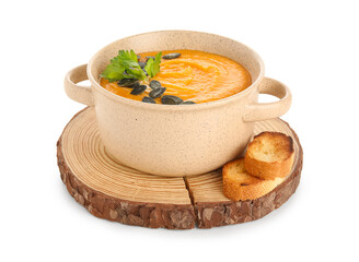 Pot of tasty pumpkin cream soup and croutons isolated on white background, closeup