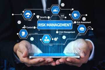 A professional image depicting hands holding a tablet showcasing risk management concepts with various technology icons. Ideal for business and finance contexts. Tessel