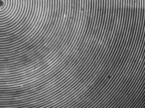 The monochrome background is part of a circular pattern.