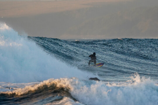 Pro surfer rides big wave in the pichilemu