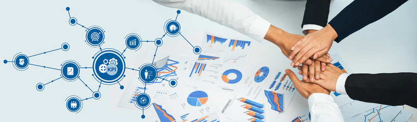 Analyst team putting hand together after successful plan of business strategy and marketing....