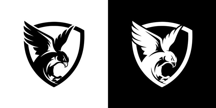 Black and white eagle logo designs on shield - Powered by Adobe