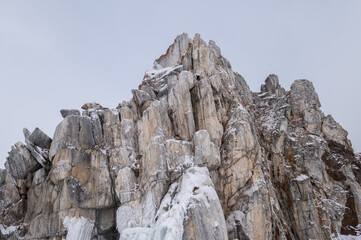 The Shaman rock one of sacred place in frozen lake Baikal in winter season of Siberia, Russia. This rock is a subject of many popular legends and myths about Baikal Lake and Angara river.