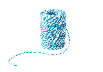 Close-up of a spool of light blue and white baker's twine for crafting and gift wrapping