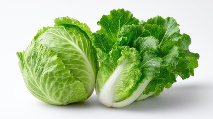 Two Fresh Green Cabbages One Round And One Leafy Displayed On A Clean White Background With Subtle Lighting Enhancing Texture