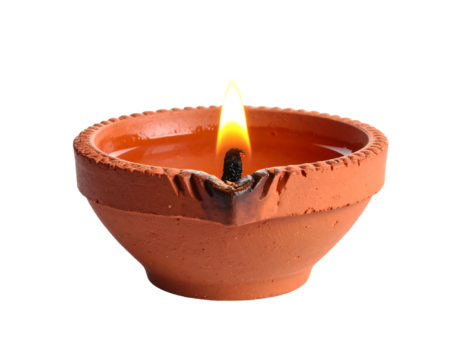 Lit earthen diya, oil lamp, flame burning bright. Dark backdrop, focus on warm glowing candle - Powered by Adobe