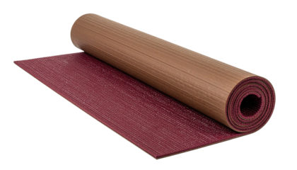 Unrolled yoga mat with brown exterior and red interior