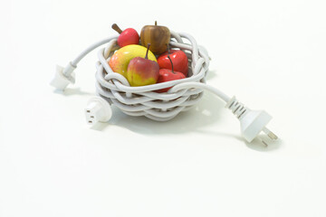 Power cables woven into a basket to hold Apples - horizontal