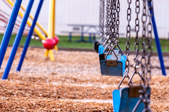 View at empty swing in the community park
