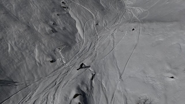 Aerial view of man is freeriding in Caucasus mountains, Gudauri, Georgia.