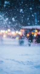 Snowfall in the city with blurred lights at night.