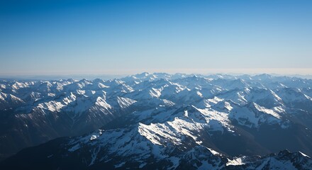 Vast Mountain Range Under a Clear Blue Sky.