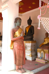 An ancient Buddha statue at a temple in Thailand