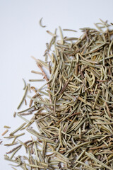 Organic dried rosemary isolated on white background