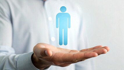 Businessman holding a virtual human symbol, representing a successful business concept idea