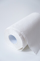 Roll of kitchen paper towel isolated on a white background