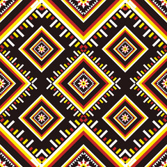 Vibrant geometric ethnic pattern seamless featuring bold diamond shapes and symmetrical tribal motifs