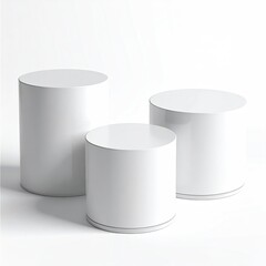 Three white, simple cylindrical podiums, different heights