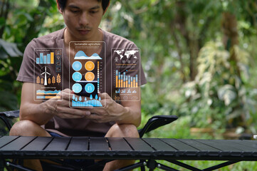 Man Using Technology to Promote Sustainability in Agriculture