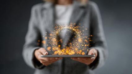 30s business woman holding a tablet surrounded by holographic big data visualizations, futuristic concept of analytics and digital innovation.