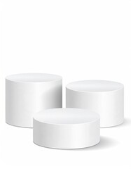 Three white cylinders, different heights, on a white background