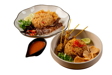 A delightful presentation of Thai cuisine: satay skewers, fried rice, and dipping sauce, artfully arranged on plates