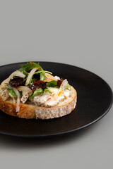 Open Sandwich with Chicken Breast, Salad, Sundry Tomato and Homemade pickle.
