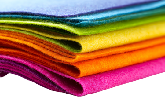 Vibrant rainbow stack of felt fabric sheets close up detail