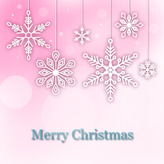 Pink Background with Hanging Snowflake Designs for Christmas Greeting Card