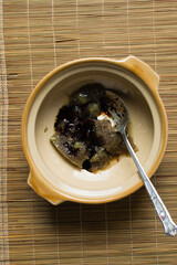 process of making soy sauce broth, Overhead view of soy sauce and beef stock in a claypot