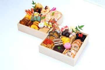 日本のお正月・新年を祝う縁起の良い料理が重箱に詰められた『おせち料理』