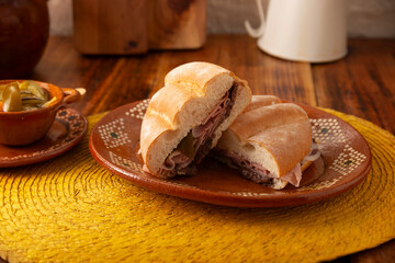 Mexican ham sandwich, in Mexico it is called Torta de Jamon, it is the most popular of the Mexican Tortas and the recipe varies depending on who prepares it, made with bolillo o telera bread.