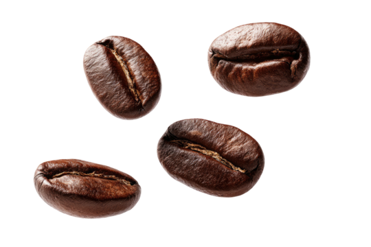 Four roasted coffee beans isolated on a black background